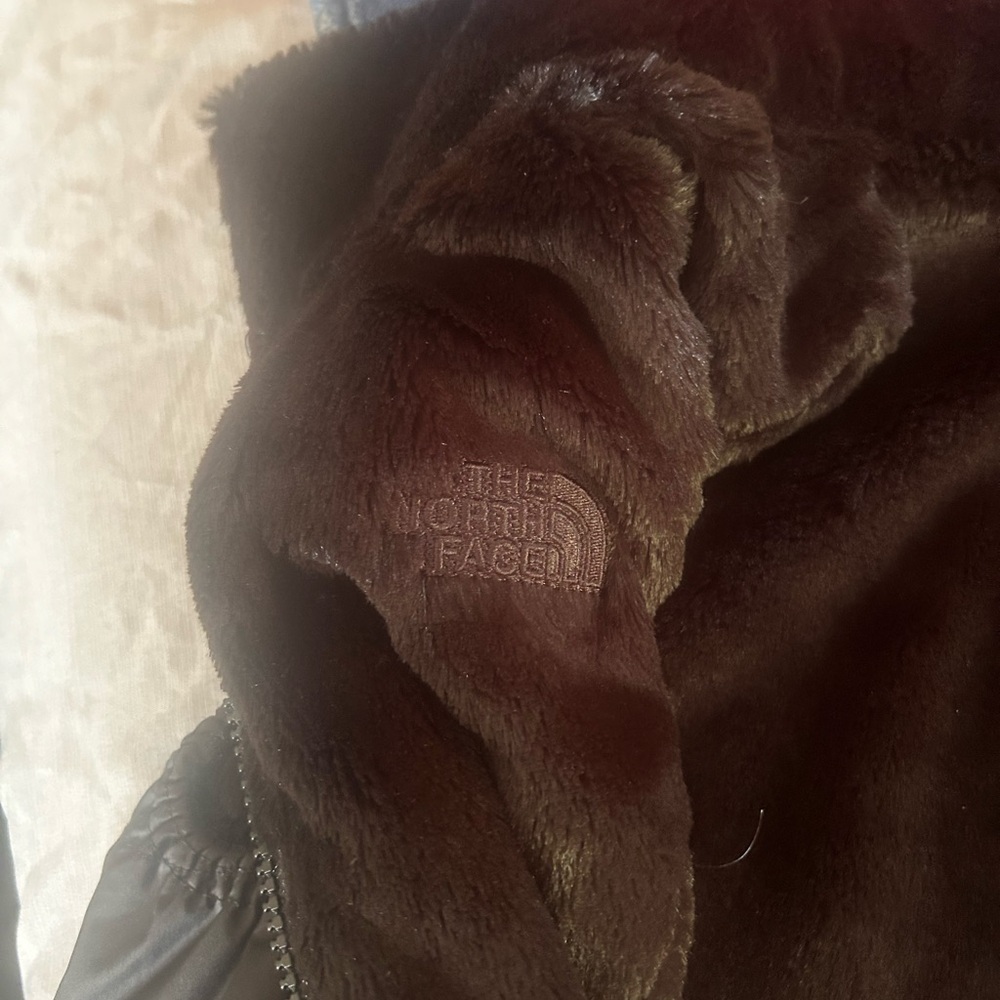 The North Face Black vest with fleece inside!
